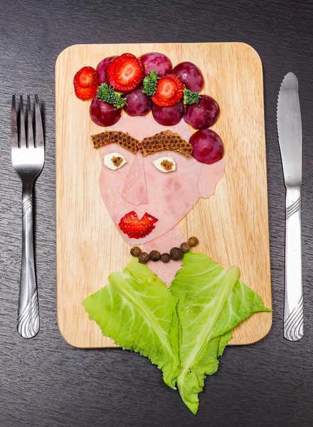 Retrato facial feito de vários produtos de mercearia fatiados, conceito de comida artística — Fotografia de Stock