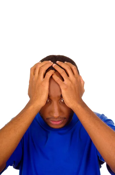 Headshot stressed man wearing strong blue colored t-shirt using hands touching his own head frustrated, white studio background — Stock Photo, Image