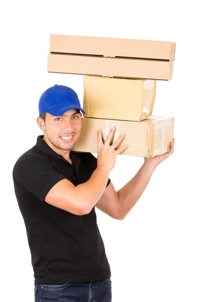 Счастливый дружелюбный человек с коробками — стоковое фото