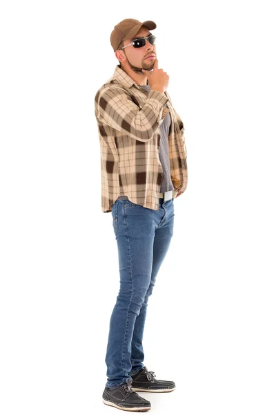 Latin man in flannel shirt cap and sunglasses standing fullbody — Stock Photo, Image