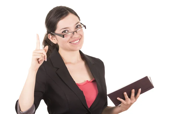 Porträt einer hübschen Lehrerin mit Brille und Buch in der Hand — Stockfoto