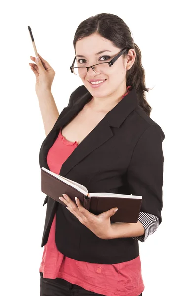 Porträt einer hübschen Lehrerin mit Brille und Buch in der Hand — Stockfoto