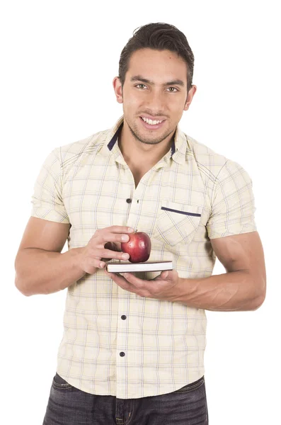 Defter ve Kırmızı elma tutan genç hapy erkek öğretmen — Stok fotoğraf