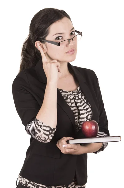 Doce professor feminino segurando maçã vermelha — Fotografia de Stock