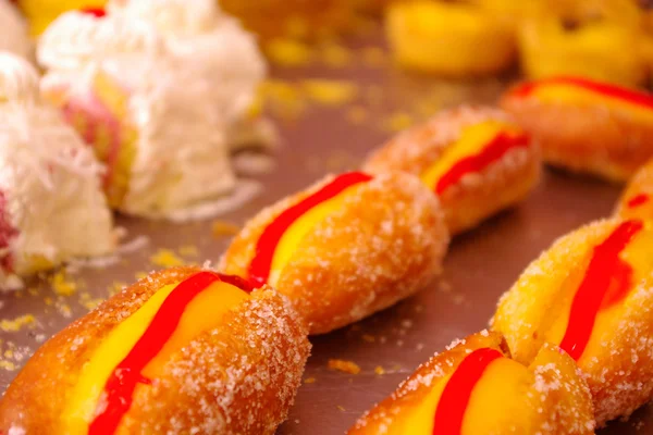 Close up of delicious dessert on Ecuador, cake and cream in hot dog form — Stock Photo, Image