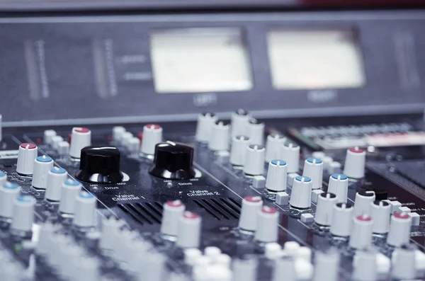 Closeup mixing faders and knobs as seen from above side angle, artistic studio equipment concept — Stock Photo, Image