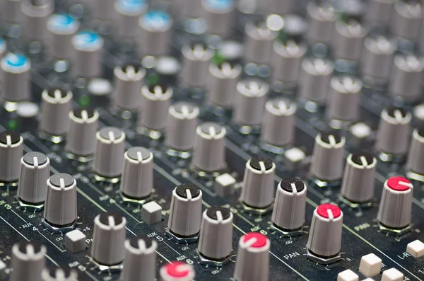 Closeup mixing faders and knobs as seen from above side angle, artistic studio equipment concept — Stock Photo, Image