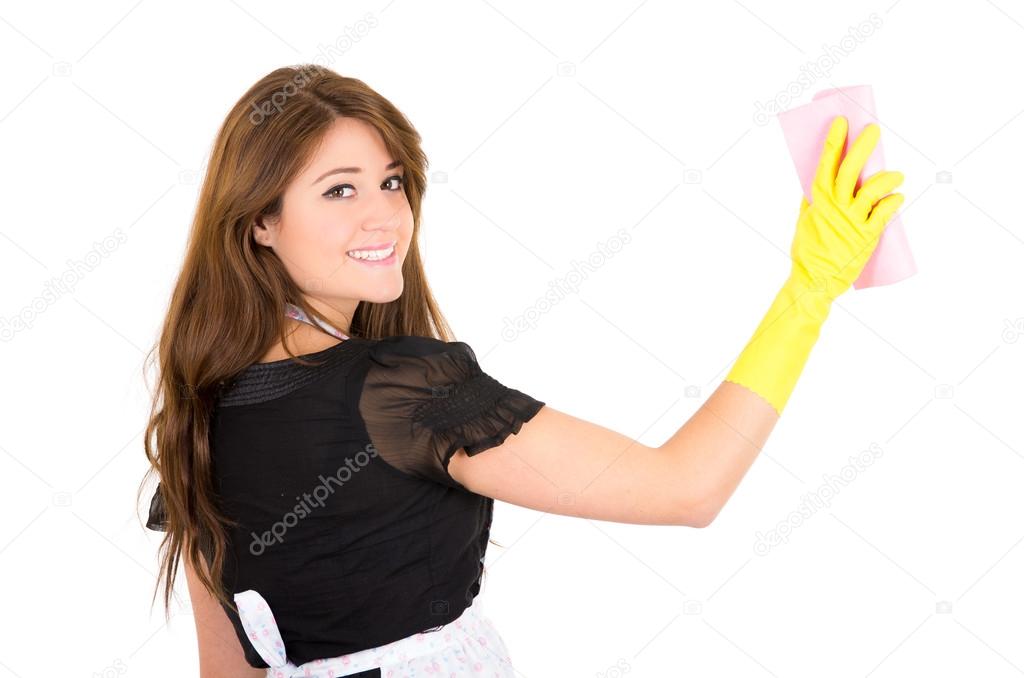 Pretty young brunette girl cleaning