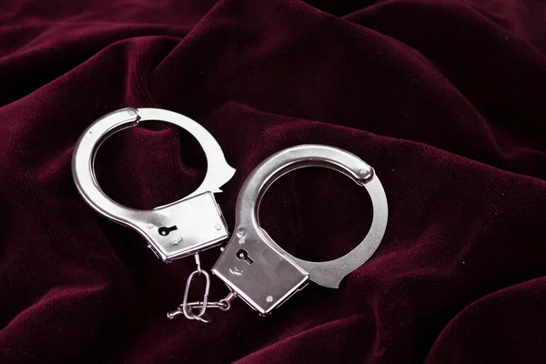 Closeup shot of metallic handcuffs — Stock Photo, Image