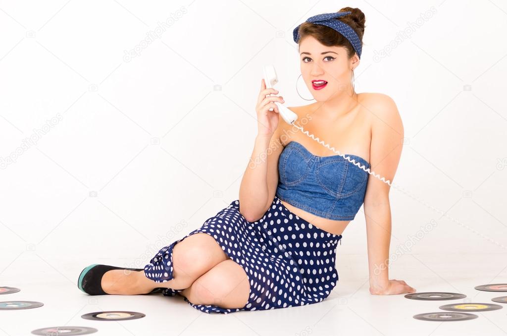 Beautiful retro young girl wearing blue vintage clothes