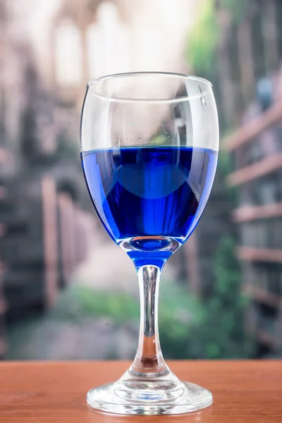 Glass with blue liquor — Stock Photo, Image