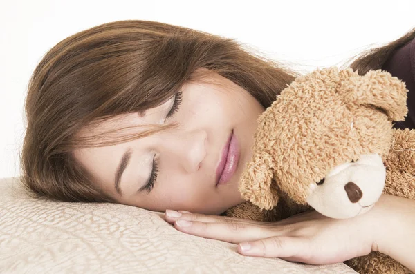 Beautiful young brunette girl sleeping — Stock Photo, Image