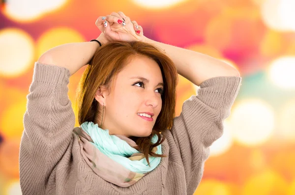 Portrait beautiful young blond girl over colorful background Stock Photo