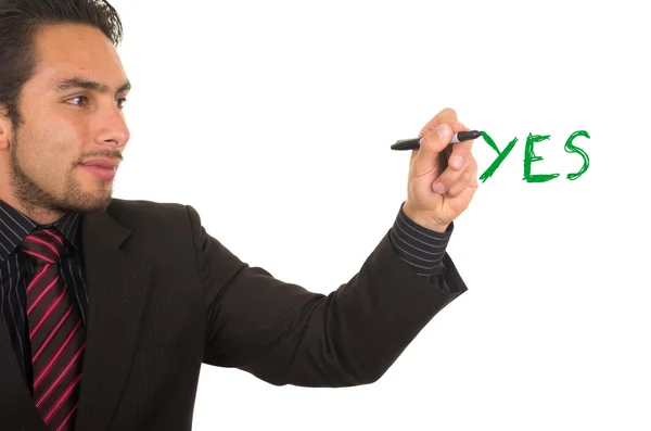 Young handsome businessman writing on whiteboard with marker — Stock Photo, Image