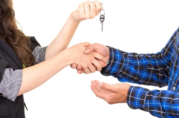 Closeup hands handing over key concept of buying deal sale realtor — Stock Photo, Image