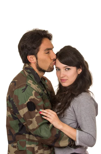 Young woman and soldier in military uniform say goodbye deployment — Stock Photo, Image