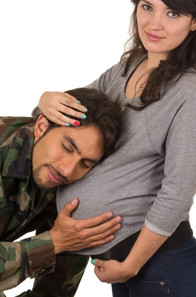 Happy proud military soldier hugging pregnant wife — Stock Photo, Image