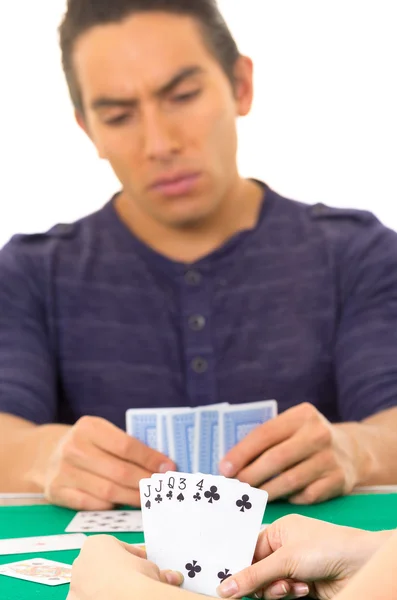 Young man playing cards cuarenta traditional Ecuadorian game — Stock Photo, Image