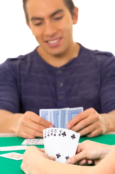 Young man playing cards cuarenta traditional Ecuadorian game — Stock Photo, Image