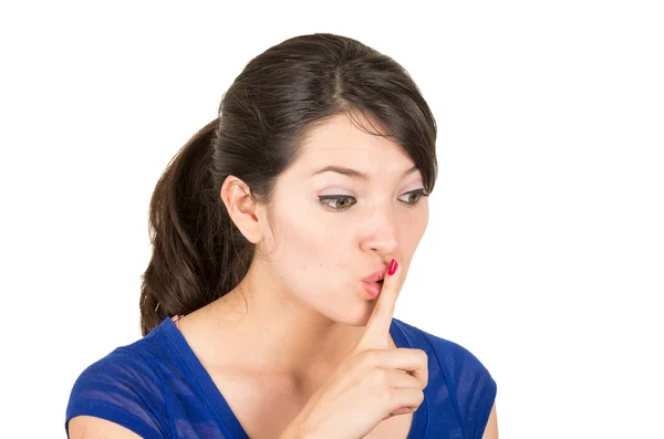 Beautiful young woman gesturing silence shhh with finger on mouth — Stock Photo, Image