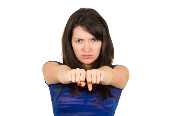 Closeup portrait of angry young girl posing with fists in front — Stock Photo, Image