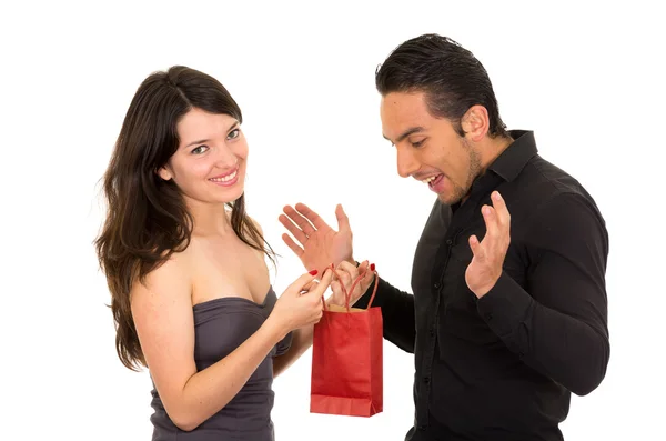 Girlfriend surprises boyfriend with a gift — Stock Photo, Image