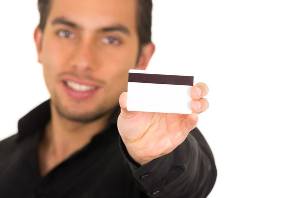 Closeup portrait of handsome young man holding credit card — Stock Photo, Image