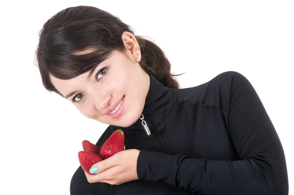 Closeup portrait young girl holding red strawberries — Stock Photo, Image