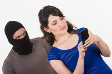 masked male thief robbing beautiful young girl clipart