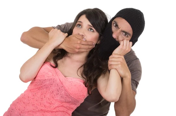 Male angry thief kidnapping holding young girl — Stock Photo, Image