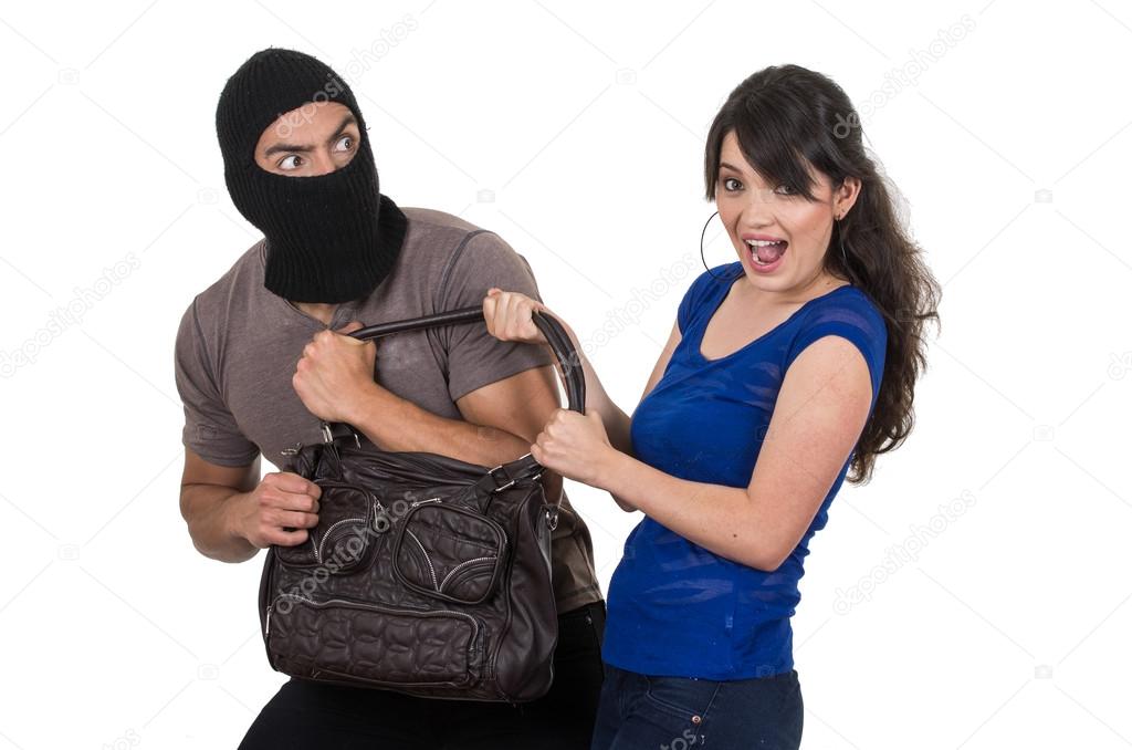 male thief robbing beautiful young girl