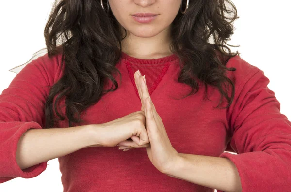 Chica vistiendo top rojo posando con un puño contra la palma —  Fotos de Stock