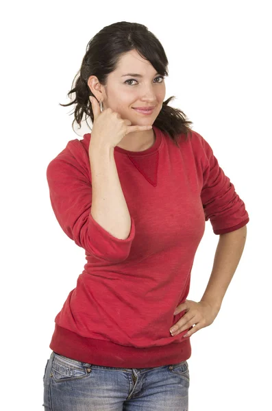 Pretty young girl wearing red top gesturing call me phone with hand — Stock Photo, Image