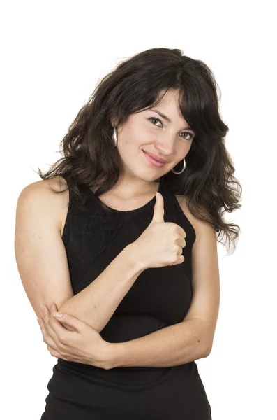 Mooie jonge brunette vrouw dragen zwarte top poseren met duim omhoog — Stockfoto