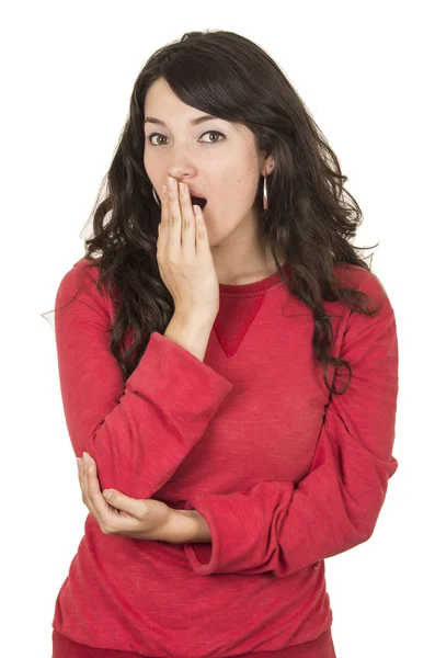 Pretty young girl wearing red top yawning — Stock Photo, Image