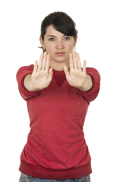 Vrij jong meisje dragen rode top poseren met handen gebaren stop — Stockfoto