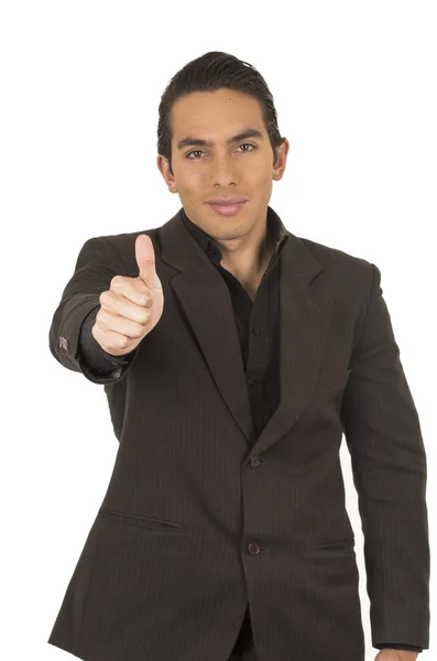 Bello giovane uomo indossando un abito in posa con pollice in su — Foto Stock