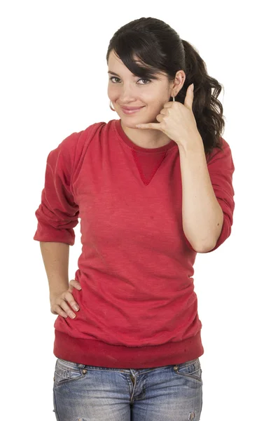 Ładna dziewczyna noszenie czerwony top gestykulacji Zadzwoń do mnie telefon z ręki — Zdjęcie stockowe