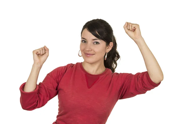 Menina bonita vestindo top vermelho posando com punhos para cima comemorando — Fotografia de Stock