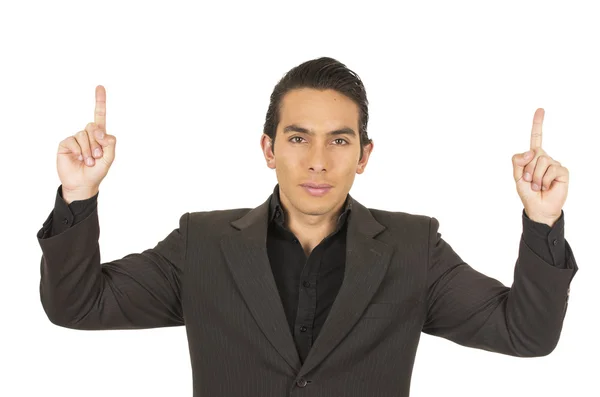 Handsome young man wearing a suit posing showing one finger — Stock Photo, Image