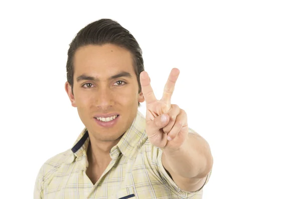 Young handsome hispanic man posing gesturing peace sign — Stock Photo, Image