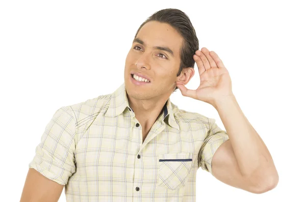 Young handsome hispanic man posing listening — Stock Photo, Image