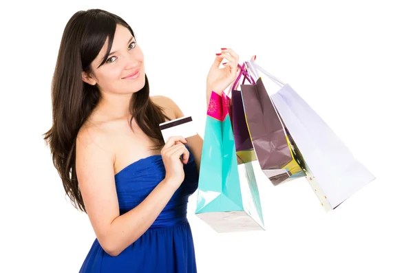 Schöne junge brünette lächelnde Frau beim Einkaufen mit Taschen — Stockfoto