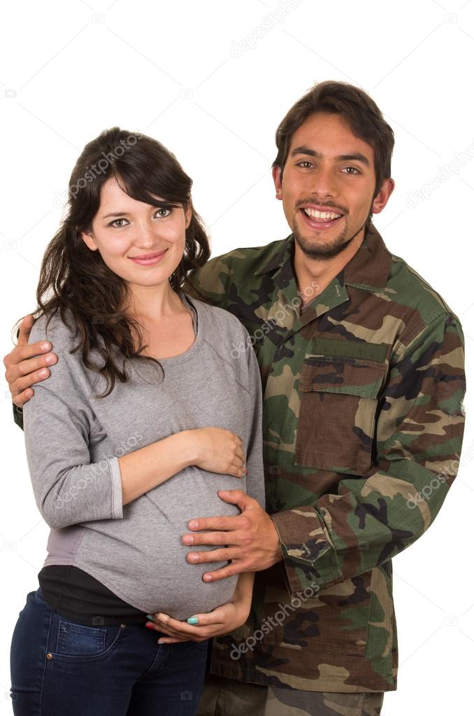 happy proud military soldier hugging pregnant wife