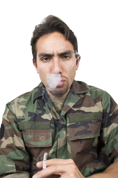 Distraught military soldier veteran ptsd smoking a cigarette — Stock Photo, Image