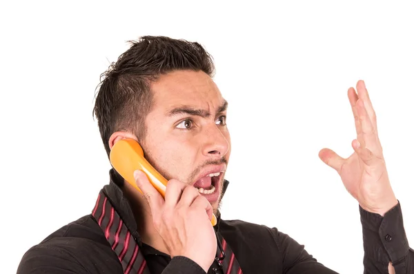 Zbliżenie portret przystojny mężczyzna hiszpanin rozmawia sznurowy telefon retro — Zdjęcie stockowe