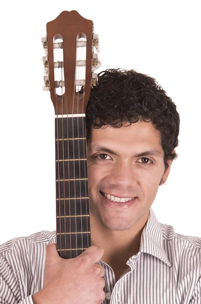 Portrait of handsome hispanic young man holding guitar — Stock Photo, Image