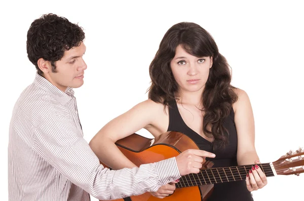 Linda frustrada estudante de guitarra feminina e professora — Fotografia de Stock