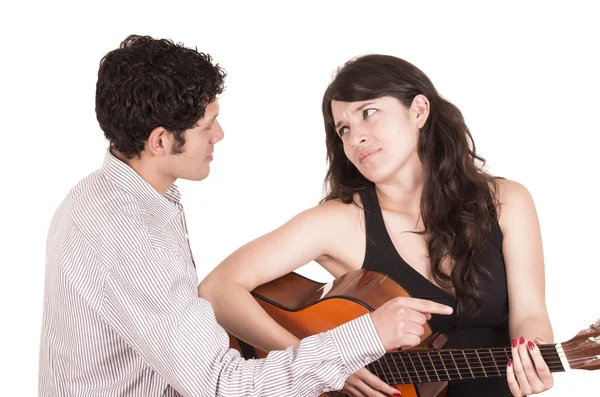 Linda frustrada estudante de guitarra feminina e professora — Fotografia de Stock