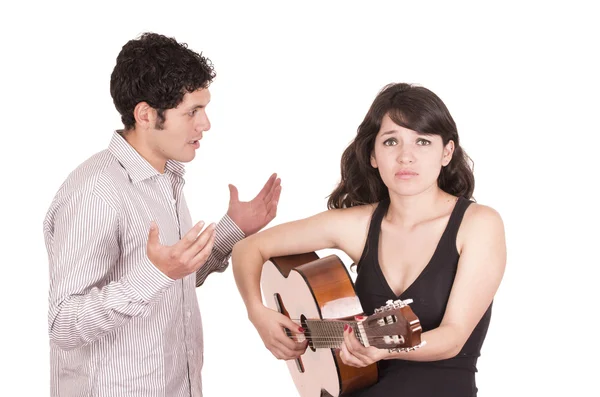 Beautiful frustrated female guitar student and teacher — Stock Photo, Image